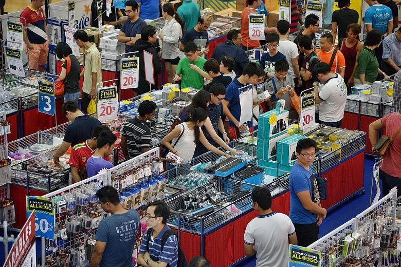 Singapore's many sales could benefit the economy by increasing production and in turn increasing employment, but excessive consumerism also puts a strain on the planet's natural resources.