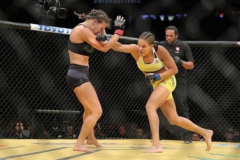 Amanda Nunes landing a punch on American Miesha Tate during their bantamweight bout at UFC200. The Brazilian was quick out of the blocks, taking just over three minutes to subdue her opponent and claim the title.