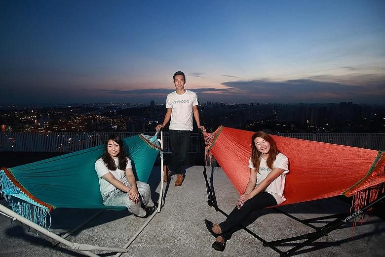 Mr Ernest Ng, founder of hammock company Airmocks, with former "externs" Huang Hui Si (left), 24, and Toh Siew Ting, 22, both of whom are NTU students. "Each extern whom I worked with brought in a new perspective," said Mr Ng.