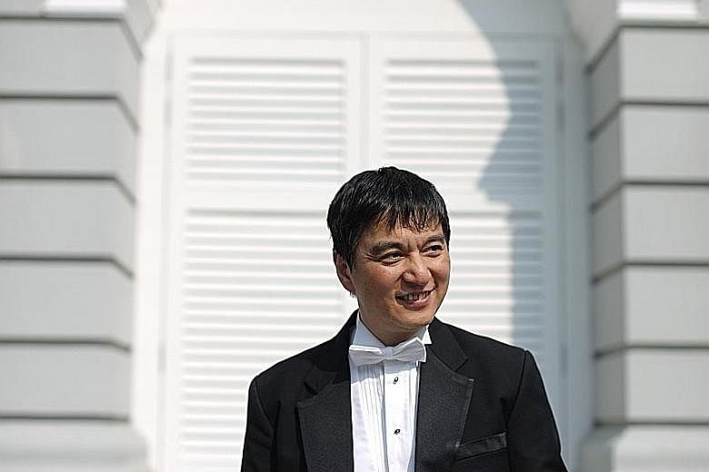 The China-born Shui Lan (above) has helped groom young conductors.