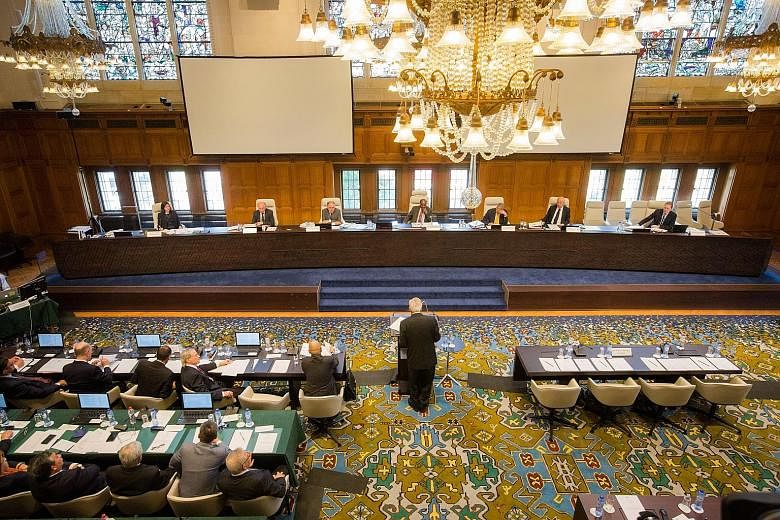 A session during the jurisdictional hearing for the case that the Philippines brought against China at the Permanent Court of Arbitration in The Hague last July. Chinese Foreign Minister Wang Yi has called the case "a political farce" and said it "ha