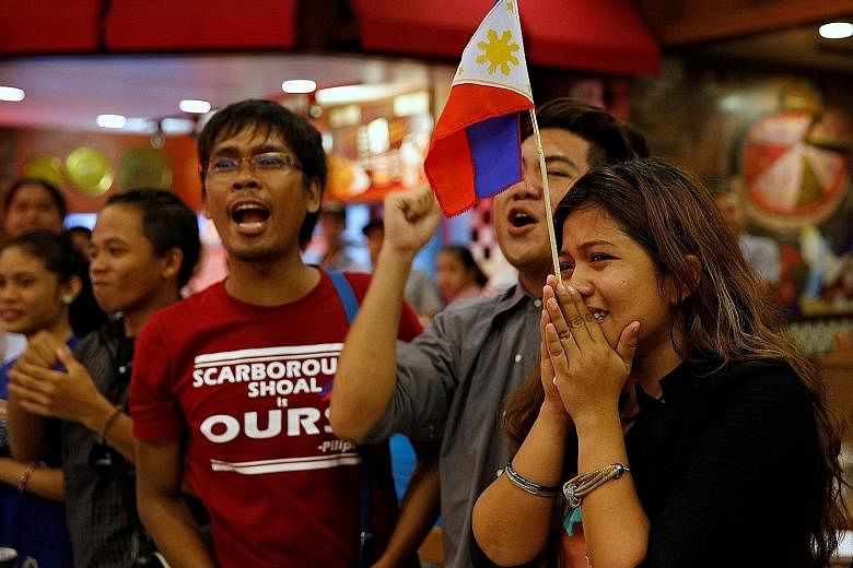 Activists who travelled to the contested Scarborough Shoal and were blocked by Chinese Coastguard a few months ago, reacting after a ruling on the South China Sea by an arbitration court in Hague, in favour of the Philippines.