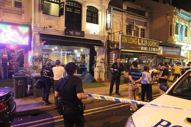 Witnesses said Mr Chua Meng Guan, 42, had challenged his assailant to a fight before a scuffle broke out outside the pub and the hostel next to it. Mr Chua was later pronounced dead at the hostel, The Trey.