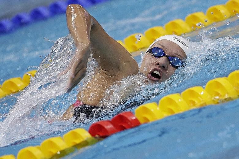 Malaysia's Khoo Cai Lin on her way to a bronze medal in the women's 800m freestyle final at the OCBC Aquatic Centre yesterday. "Since I wasn't going to Rio, I sort of eased off on training a bit," she said of her current form.