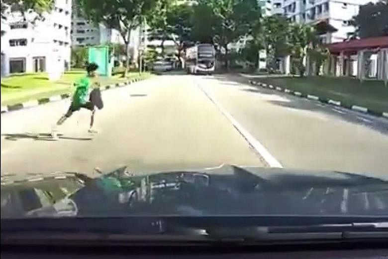 Video footage uploaded to social media shows the primary school boy dashing across the road (left) and being hit by a car. He did not appear to be seriously hurt. The boy's school, which declined to be named, said he "received treatment in the hospit