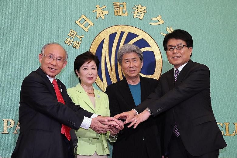 The candidates for the upcoming July 31 election include (from left) lawyer Kenji Utsunomiya, former defence and environment minister Yuriko Koike, journalist Shuntaro Torigoe and former internal affairs and communications minister Hiroya Masuda.