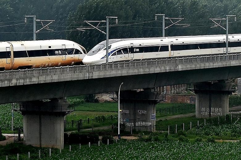 Two Chinese trains dashing at 420kmh in opposite directions passed each other on parallel tracks yesterday, in the latest feat achieved by China in high-speed rail. At about 11.20am, the two trains, "Golden Phoenix" and "Dolphin Blue", crossed on lin