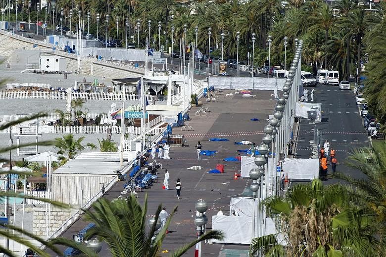 Crime scene investigators at work on the Promenade des Anglais in Nice, France, after Tunisian-born Frenchman Mohamed Lahouaiej-Bouhlel, 31, ploughed a truck into a crowd celebrating Bastille Day last Thursday.