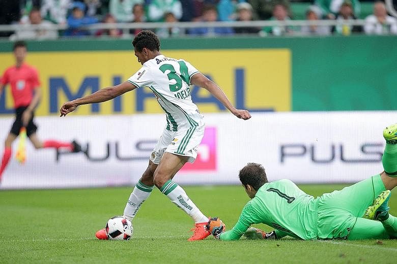 Joelinton rounding Chelsea goalkeeper Asmir Begovic to score Rapid Vienna's opener in their friendly. New coach Antonio Conte knows the Blues have a lot to do to get ready for the new season.