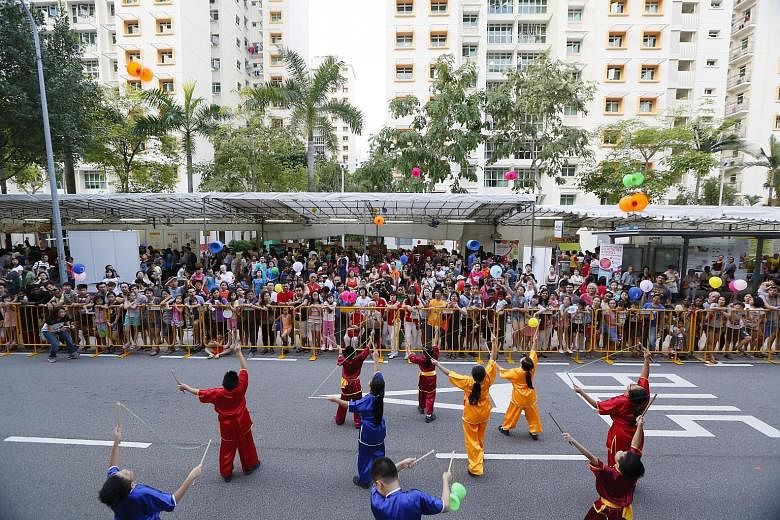 Children performing at the 12th Punggol North Racial and Religious Harmony Street Parade and Family Carnival, attended by some 12,000 residents, in Punggol Field Road yesterday.