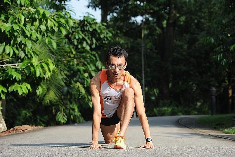 Dr Cheng training for a run at the Botanic Gardens.
