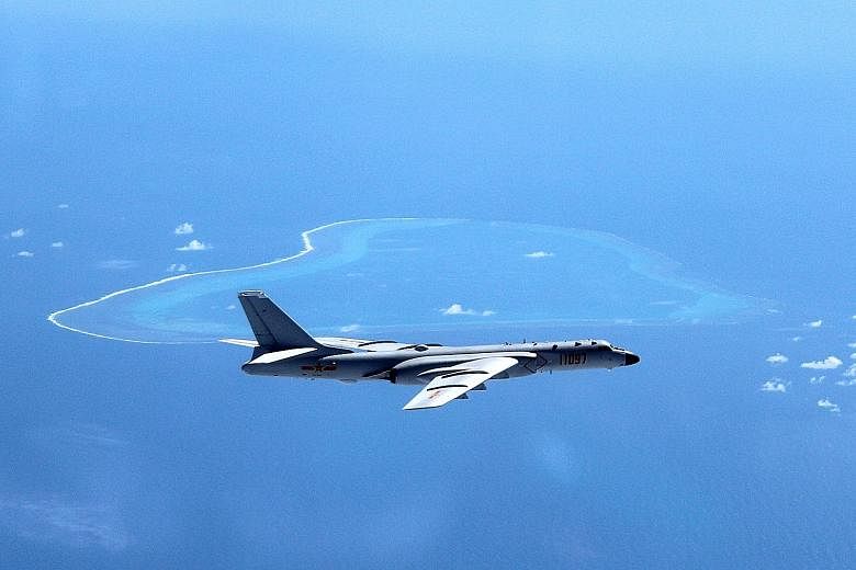 A Chinese H-6K bomber patrolling the South China Sea in an undated photo. In his congratulatory note to China to commemorate 25 years of dialogue partnership yesterday, Asean secretary-general Mr Minh reminded the country of a 2002 agreement to exerc