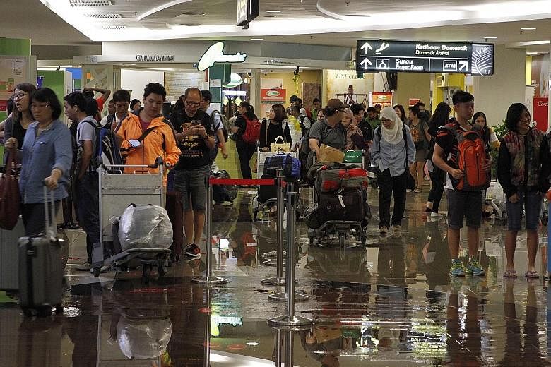 Penang International Airport and other areas were flooded by heavy rain yesterday. Water levels in the airport's arrival hall reached 0.3m at 5pm before subsiding about an hour later. Other areas affected included Permatang Datang Laut, Teluk Bahang 