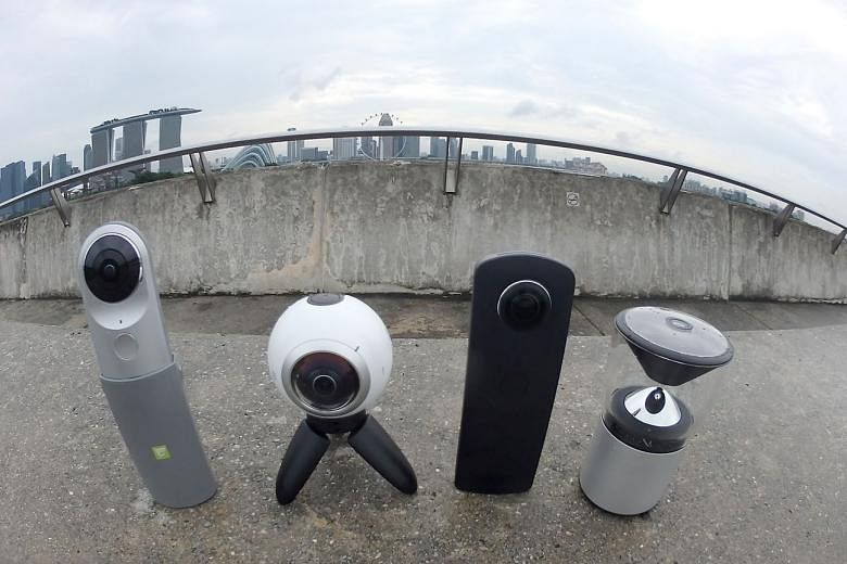 360-degree cameras - (from left) the LG 360 Cam, the Samsung Gear 360, the Ricoh Theta S and VSN Mobil V.360 - are standing tall now. 