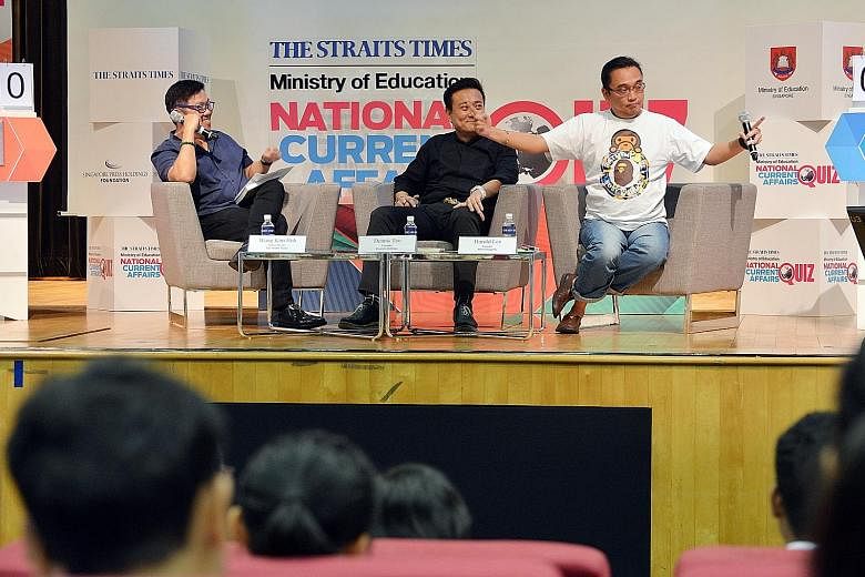 At the talk yesterday, The Straits Times' Mr Wong (left) invited his guests, Mr Teo (centre) and Mr Lee, to recount their "samseng" youth. Both guests are now bosses of their own companies.
