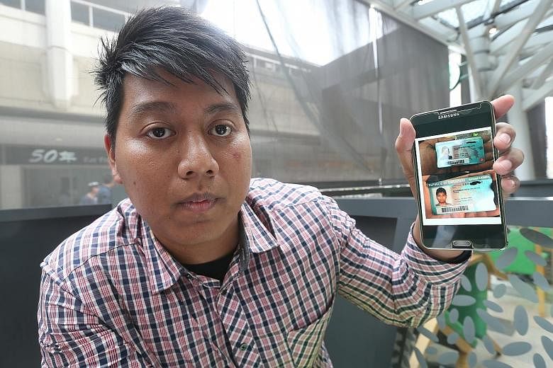 Mr Rizal shows a photo of a duplicate driving licence (the one above) with his name and IC number, but with his brother Redzuan's photo. The driving licence below is his real licence. Redzuan has impersonated his younger sibling on over a dozen occas
