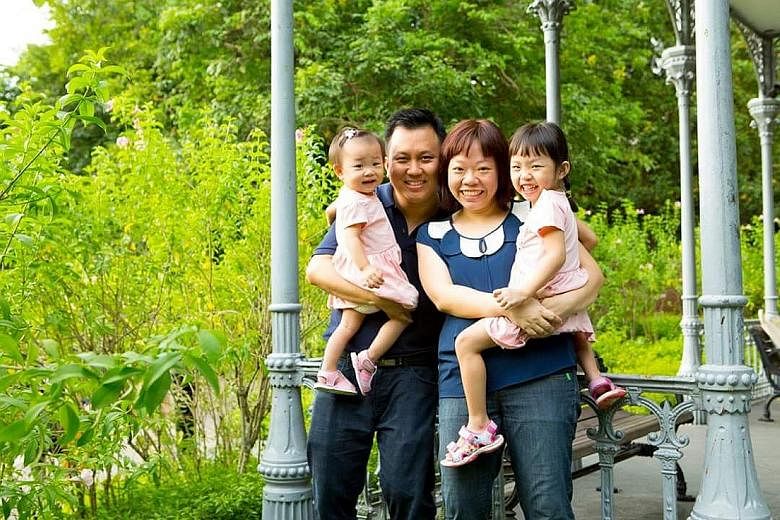 Mr Edmund Lim with his wife, Pearlyn Ng, and their daughters, Jazzel, four, and Jannah, two.