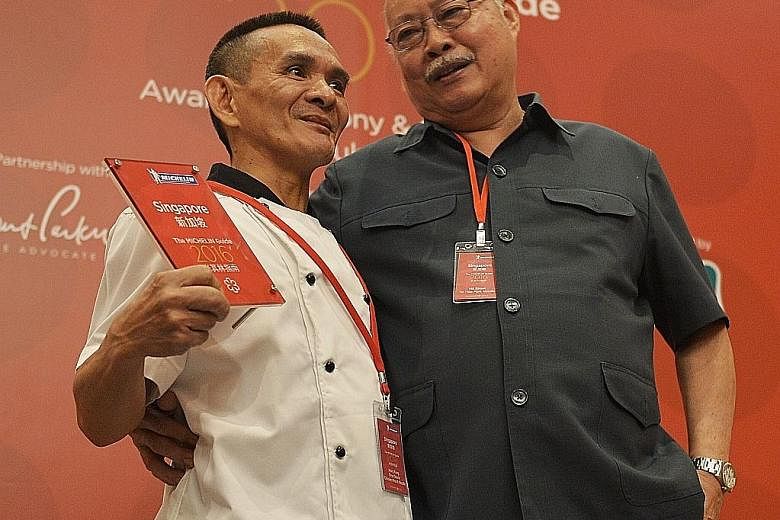 Singapore's first Michelin-starred hawker stalls are Hong Kong Soya Sauce Chicken Rice & Noodle at Chinatown Food Complex run by Mr Chan Hon Meng (left), 51; and Hill Street Tai Hwa Pork Noodle in Crawford Lane, run by Mr Tang Chay Seng, 70. The two 