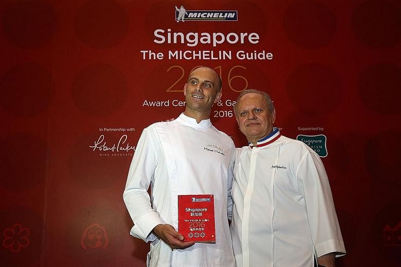Chef Joel Robuchon (right) and executive chef Michael Michaelidis of Joel Robuchon Restaurant at Resorts World Sentosa, the only restaurant here to be awarded three Michelin stars.