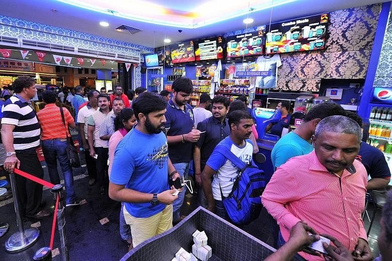 Long queues formed yesterday at Rex cinema in Mackenzie Road which was screening Kabali, the highly-anticipated new movie starring Tamil movie superstar Rajinikanth.