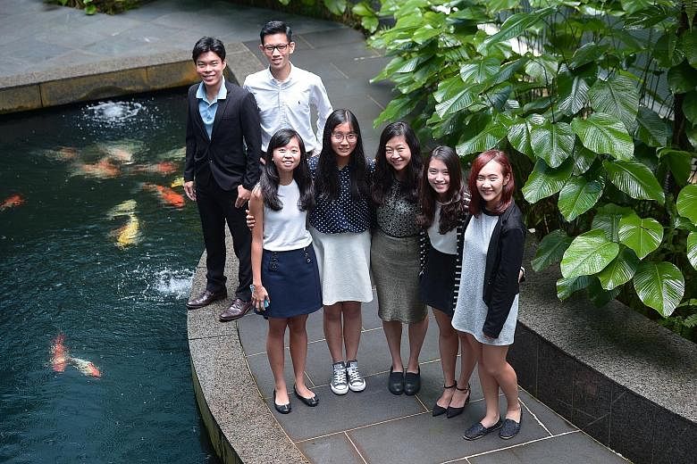 Journalism scholarship recipients (back row, from left) Clement Yong, 21; Ng Keng Gene, 21; (front row) Miss Wong Shiying, 19; Miss Ang Qing, 19; Miss Jessie Lim, 19; Miss Lee Geng Wei, 19; and Miss Zhang Xi Ying, 19.