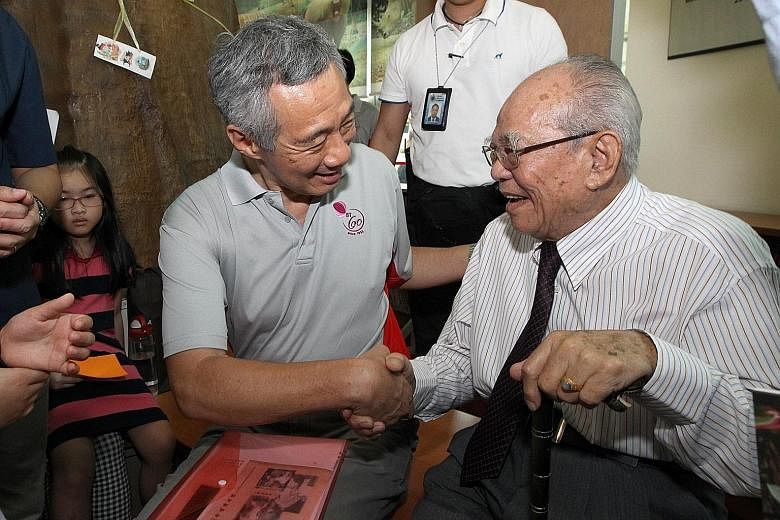 PM Lee with Mr Chor at the 60th Anniversary of Bukit Timah celebrations last year. Mr Lee said that Mr Chor, as MP for Bukit Timah, saw the poor neighbourhood turn into a beautiful modern estate, and improved the lives of residents.