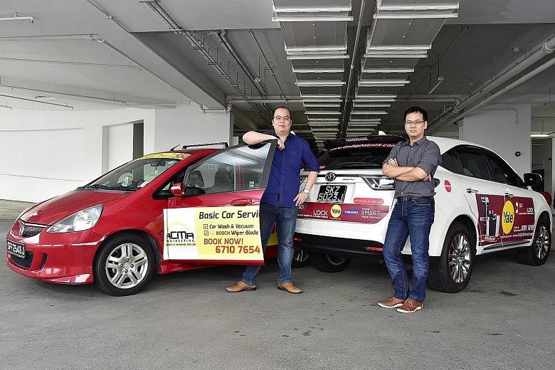 Managing director Max Lin (left) and executive director Michael Xu of Adogo, which pays drivers to carry ads for its clients on their cars. But not all are open to the idea - when ST polled 10 car owners, eight rejected the idea, one was neutral and 