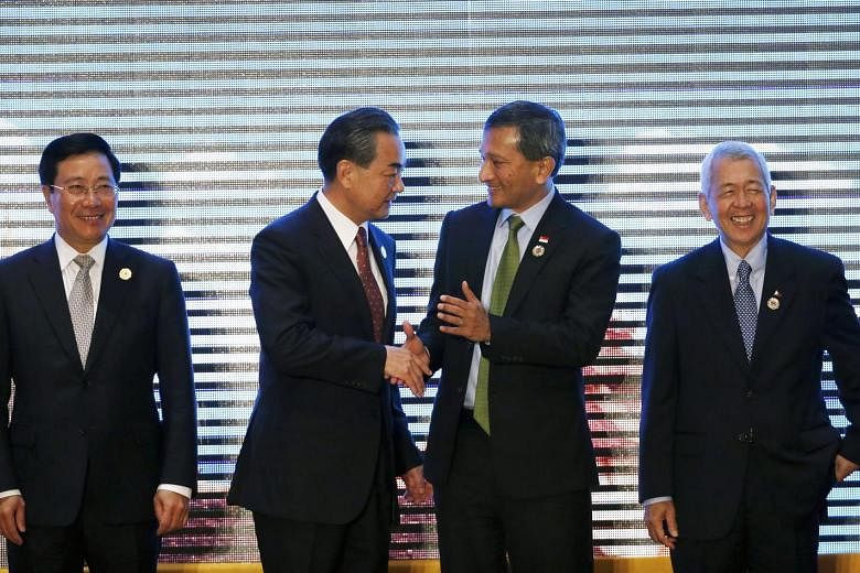 (From left) Vietnamese Foreign Minister Pham Binh Min, Chinese Foreign Minister Wang Yi, Dr Balakrishnan and Philippine Foreign Affairs Secretary Perfecto Yasay Jr at the Asean-China ministerial meeting yesterday.