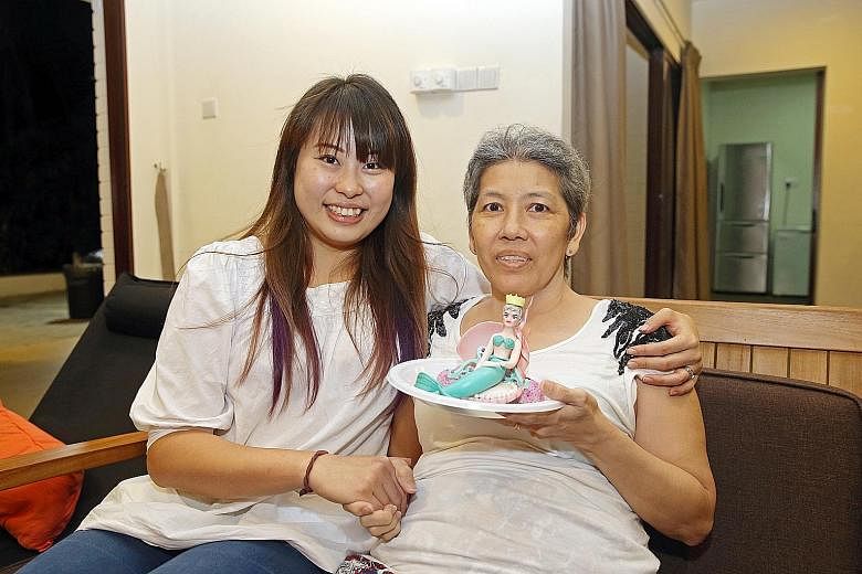 It took Ms Wong (right, with Madam Seow) six days to make the cake that was topped with 11 hand-sculpted figurines (above) - and she did it for free to help lift Madam Seow's spirits. The older woman, who likes mermaids, loved the cake so much she ha