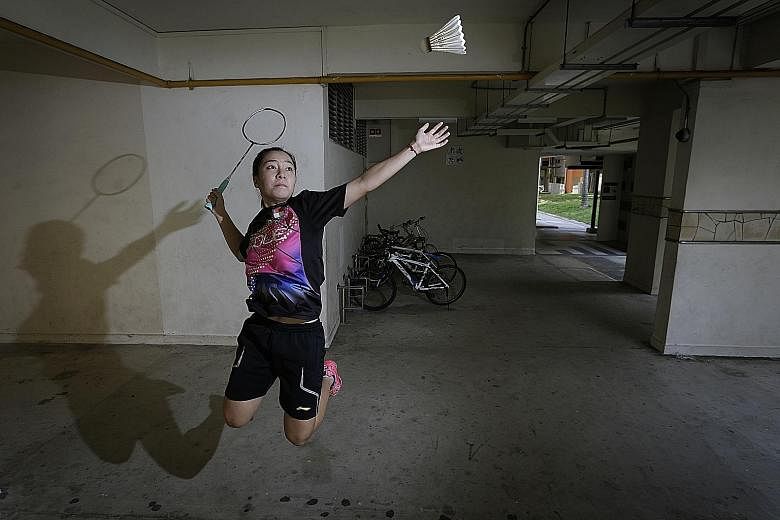 Liang Xiaoyu, who will be making her Olympic debut in Rio, at the void deck in Marsiling Crescent, where the 20-year-old has been sharpening her badminton techniques since 2007.