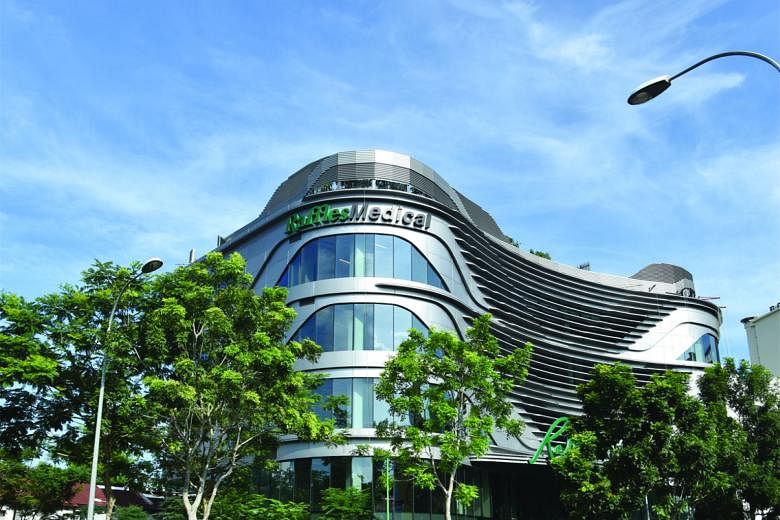 The group's first property venture, Raffles Holland V mall (left), opened last month.