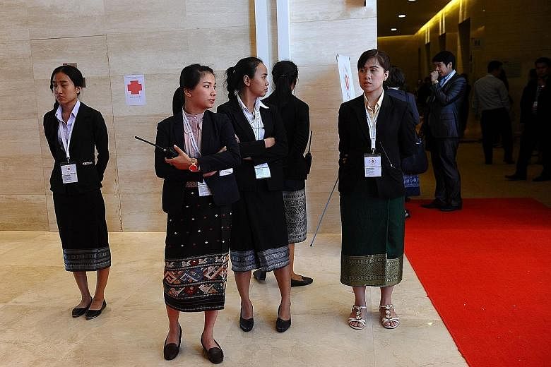 Students from the National University of Laos, armed with little more than walkie-talkies and patience, are in charge of VIP security at the Asean ministerial meeting in Vientiane.