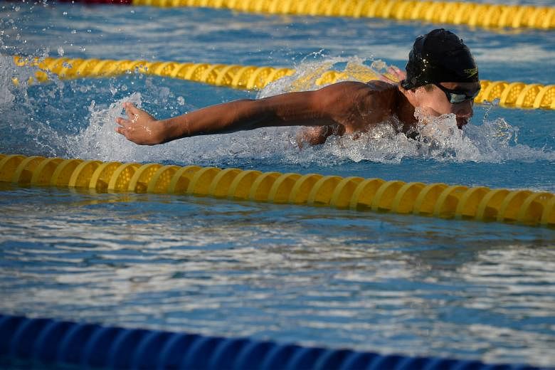 Ong Jung Yi in action in the 4x100m medley relay final at the 8th Asean Schools Games yesterday. The team finished with a bronze but he won a gold in the 200m butterfly earlier in the day. 