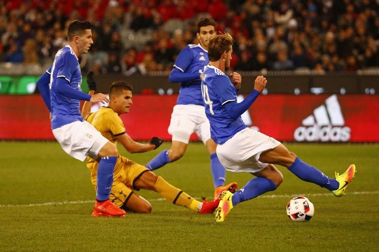 Tottenham's Erik Lamela (in yellow) grabbing a consolation goal for his side in their 2-1 defeat by Serie A champions Juventus in Melbourne. 
