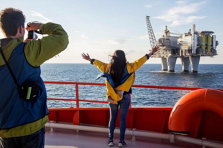 A group of 120 tourists, almost all Norwegians, each paid between $950 and $4,750 for four days on board an offshore vessel for a tour of some of the country's oil rigs - the first such tour ever.