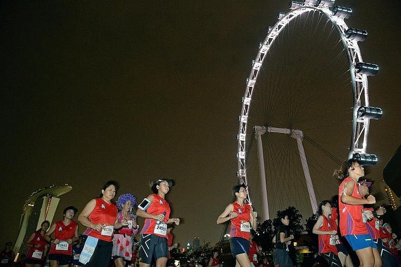 Great Eastern Women's Run participants running past the Singapore Flyer in last year's event, which won the Best Local Sports Event of the Year (Local) at this year's Singapore Sports Awards.