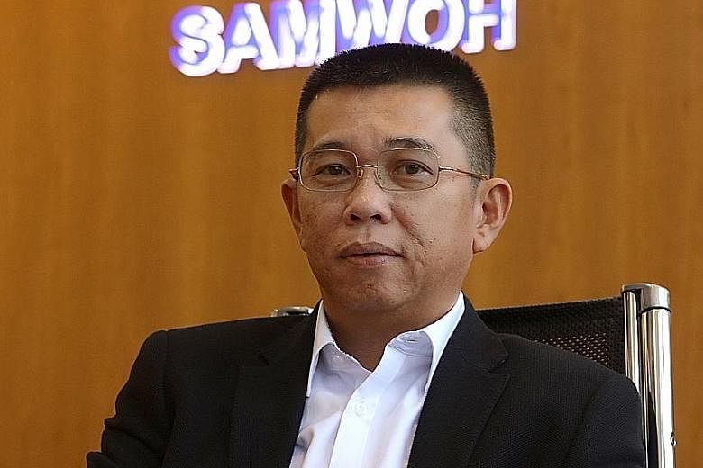 Mr Eric Soh (above), Samwoh Corporation chief executive and one of the defendants, said he was pleased with the verdict. The company (right) was founded in 1975 as Samwoh Transport and Trading by three friends.