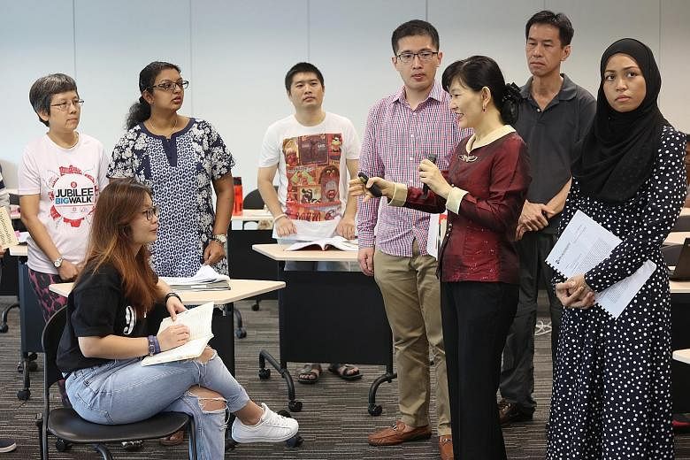 In Dr Helen Ko's (in red) Gerontological Counselling class at UniSIM, many of the students are in their 30s and 40s.