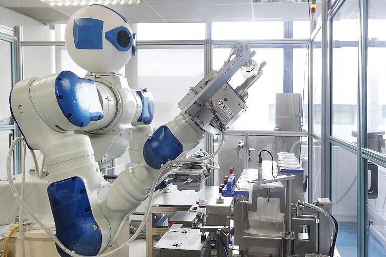 A robot designed for an industrial microbiological testing laboratory that provides tests for products, including general food products and traditional Chinese medicine.