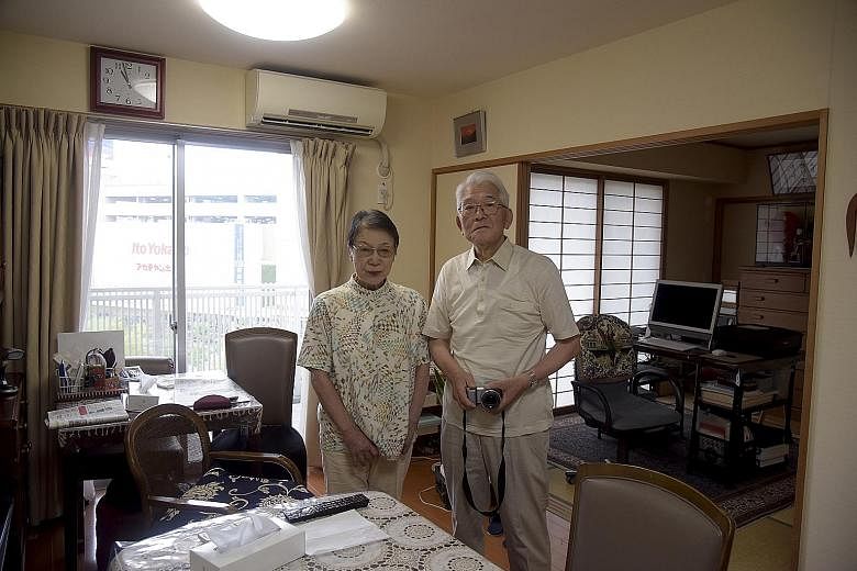 Dr Jun Sasaki (at right) said research has shown the benefits of single rooms compared with shared ones. With him is Dr Kenichi Sato, a consultant and instructor at the Japan Primary Care Association. Mrs Yoshiko Takahashi, 81, and her husband Akio T