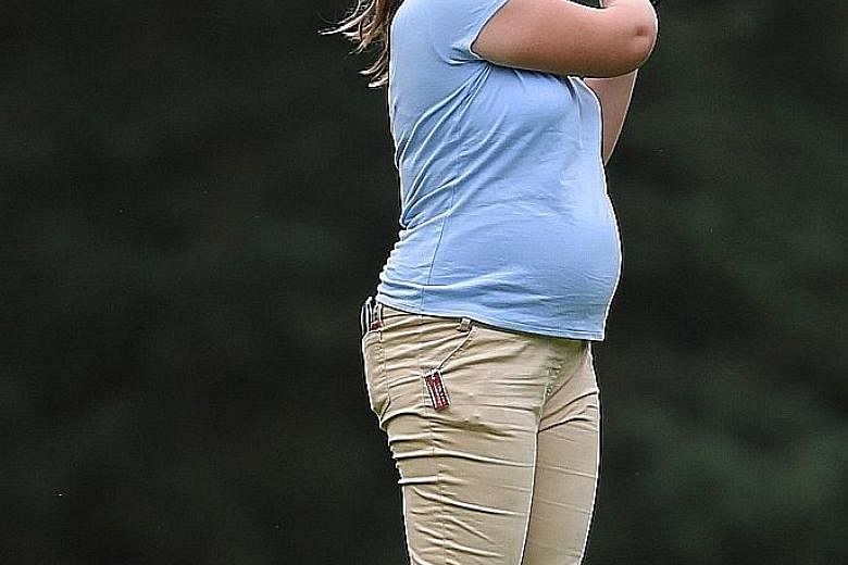 The only thing that stopped England's Liz Young, who is heavily pregnant, from playing was a missed cut.