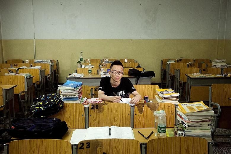 Communication engineering student Xian Guangnan, 21, at Beijing Information Science and Technology University. While the government has built hundreds of universities in recent years, many varsities are mired in bureaucracy and lax academic standards