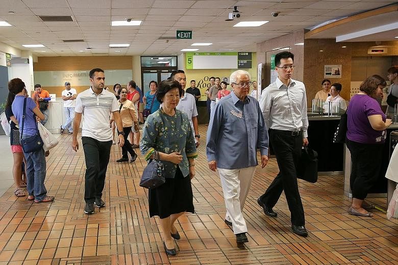 At the Singapore General Hospital to visit Mr Nathan yesterday were (above) President Tony Tan and Mrs Tan, and (below) Acting Prime Minister Teo Chee Hean and Mrs Teo. They were among the Singapore leaders who visited the former president after he s