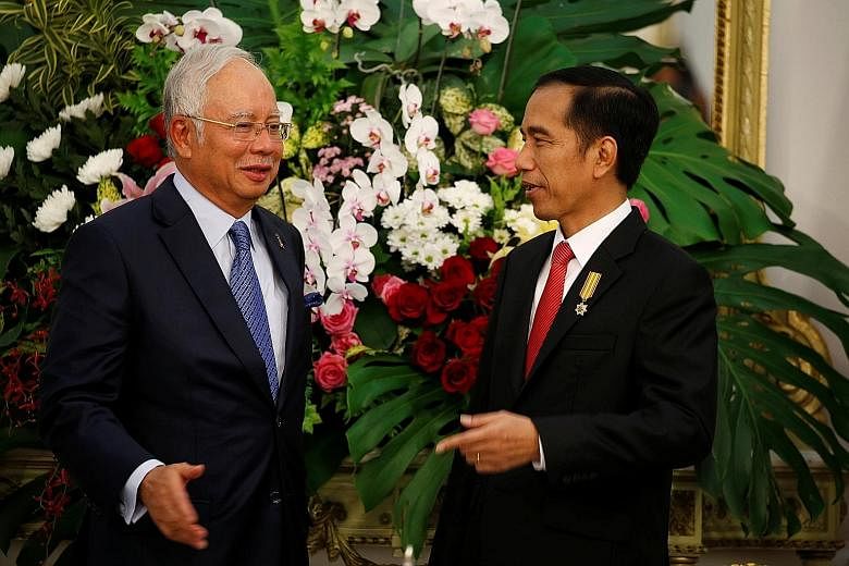 Prime Minister Najib with President Joko after a bilateral meeting at the Presidential Palace yesterday. Both sides also signed an agreement to boost cooperation to campaign against anti-palm oil lobby groups.
