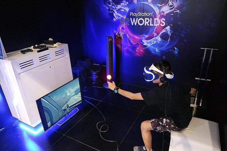 A gamer trying out the Sony PlayStation VR headset at Ani-Com & Games Hong Kong last week.