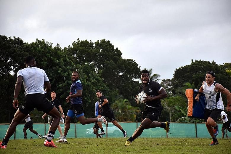 Fiji rugby sevens winger Samisoni Viriviri (with the ball) during a training session before their departure for Rio, where they are favoured to win the gold medal.