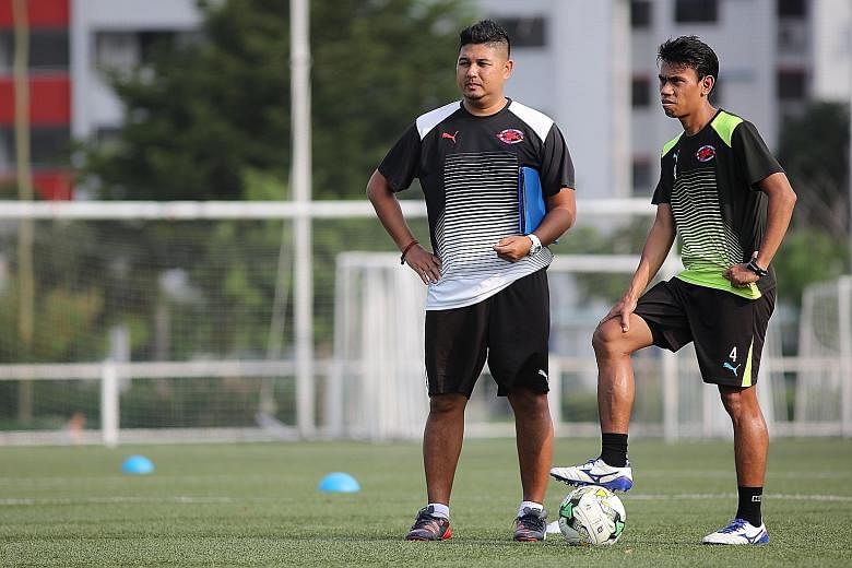 New Home United coach Aidil Sharin (far left) and Juma'at Jantan at training. Despite performing relatively well and developing younger players, Philippe Aw was removed from the club's top coaching post and redeployed as head of youth development and
