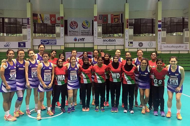 The Singapore national netball team (in purple) kept up their blistering form at the Asian Netball Championships in Bangkok yesterday, as they thrashed the Maldives 83-6 in their final group game. The defending champions finished top of Group A, and 