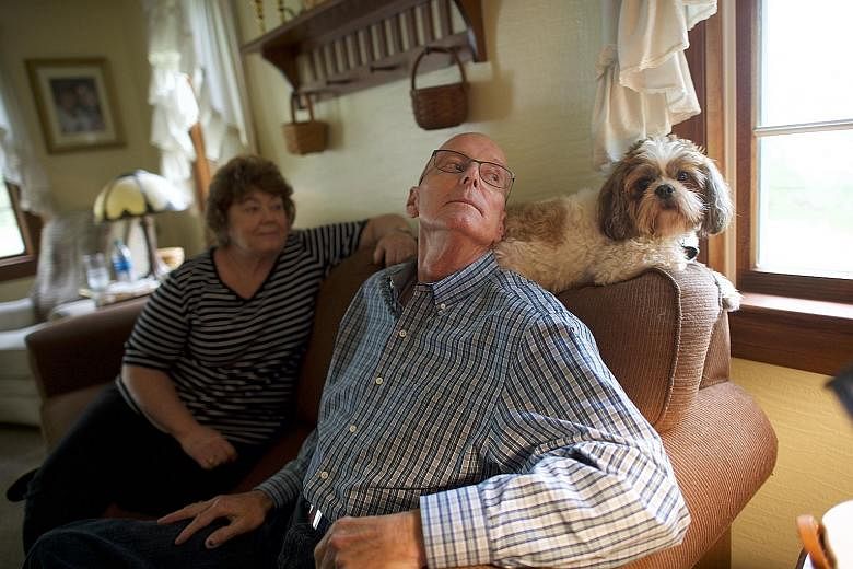 Mr Ludwig with his wife and dog in May. He is now free of cancer, after having received cell therapy for chronic lymphocytic leukaemia in 2010. He and his wife are "trying to make up for lost time", he said. Dr Rosenberg at the National Cancer Instit