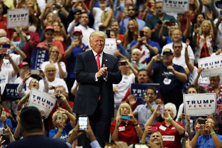 Mr Trump addressing the crowd on Wednesday in Daytona, Florida. With the surge in funds Mr Trump managed to raise from small donors, it suggests he may now have the resources to compete with Mrs Clinton in the closing stretch of the campaign.